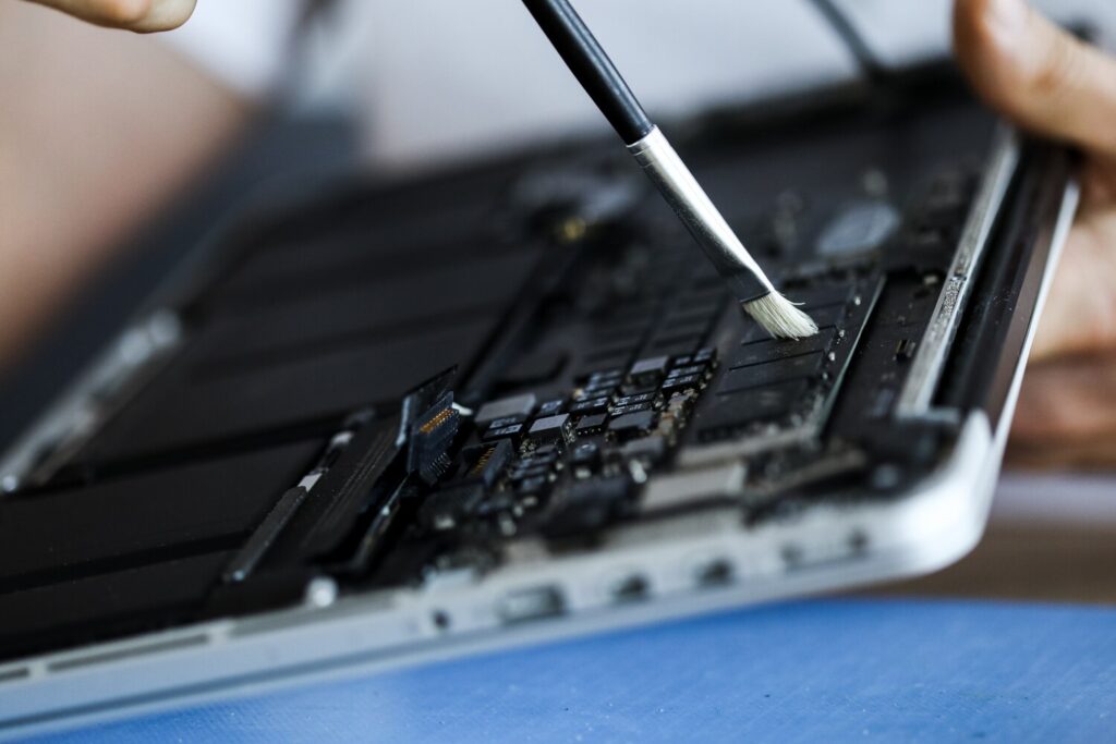 Computer repair concept close up view hardware clearing notebook 209729 292